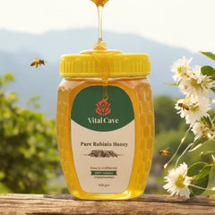 Jar of Vital Cave Pure Robinia Honey with bees and flowers in the background vital cave organics