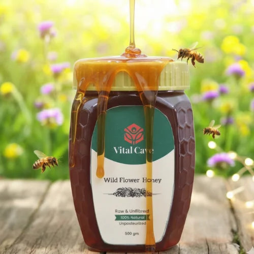 Jar of Vital Cave Wild Flower Honey with bees and flowers in the background vitalcave organics